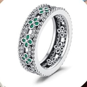 Sterling silver 🍀💎 ring features simulated green emeralds Eternity Band Style